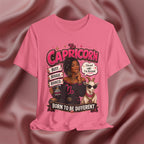 Charity Pink t-shirt with Capricorn zodiac design featuring a woman and goat on a textured pink background