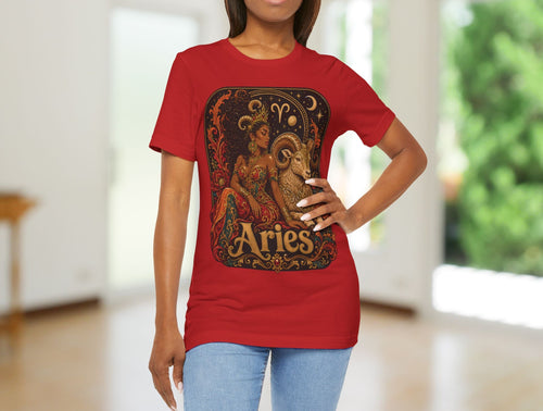 Person wearing a red t-shirt with Aries zodiac design indoors.