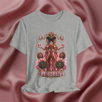 Gray t-shirt with Gemini zodiac design on a pink fabric background