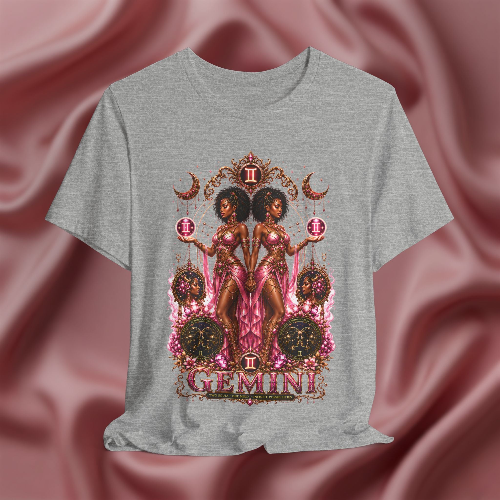 Gray t-shirt with Gemini twins zodiac design on a pink fabric background