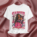 White t-shirt with Cancer zodiac design featuring a woman on a pink fabric background