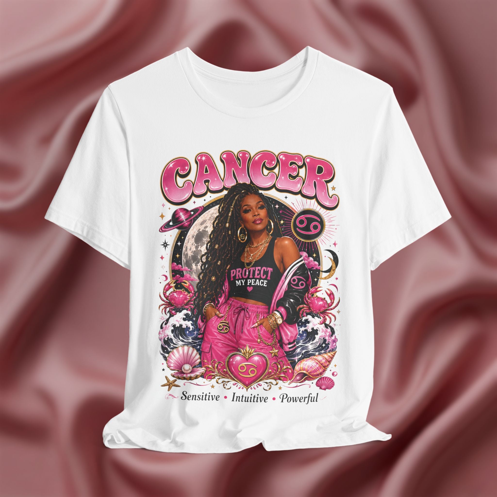 White t-shirt with Cancer zodiac design featuring a woman on a pink fabric background